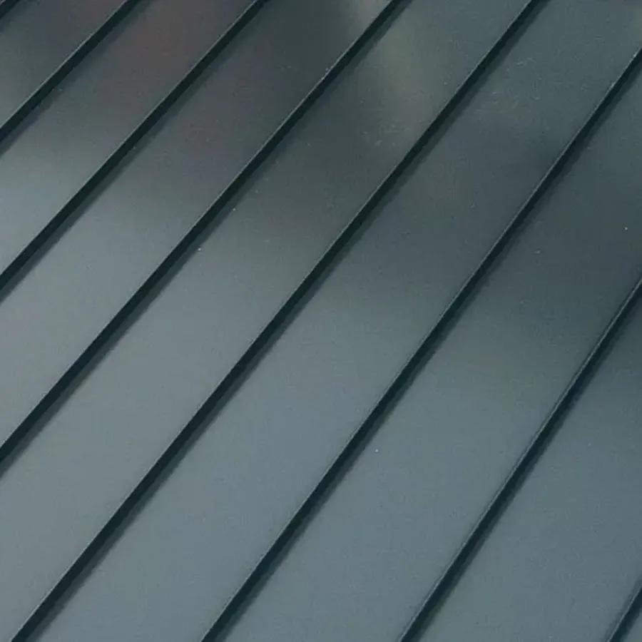 Close-up of dark grey standing seam metal panels