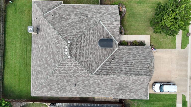 Straight-down drone aerial roof inspection photo of a home in Edmond, Oklahoma